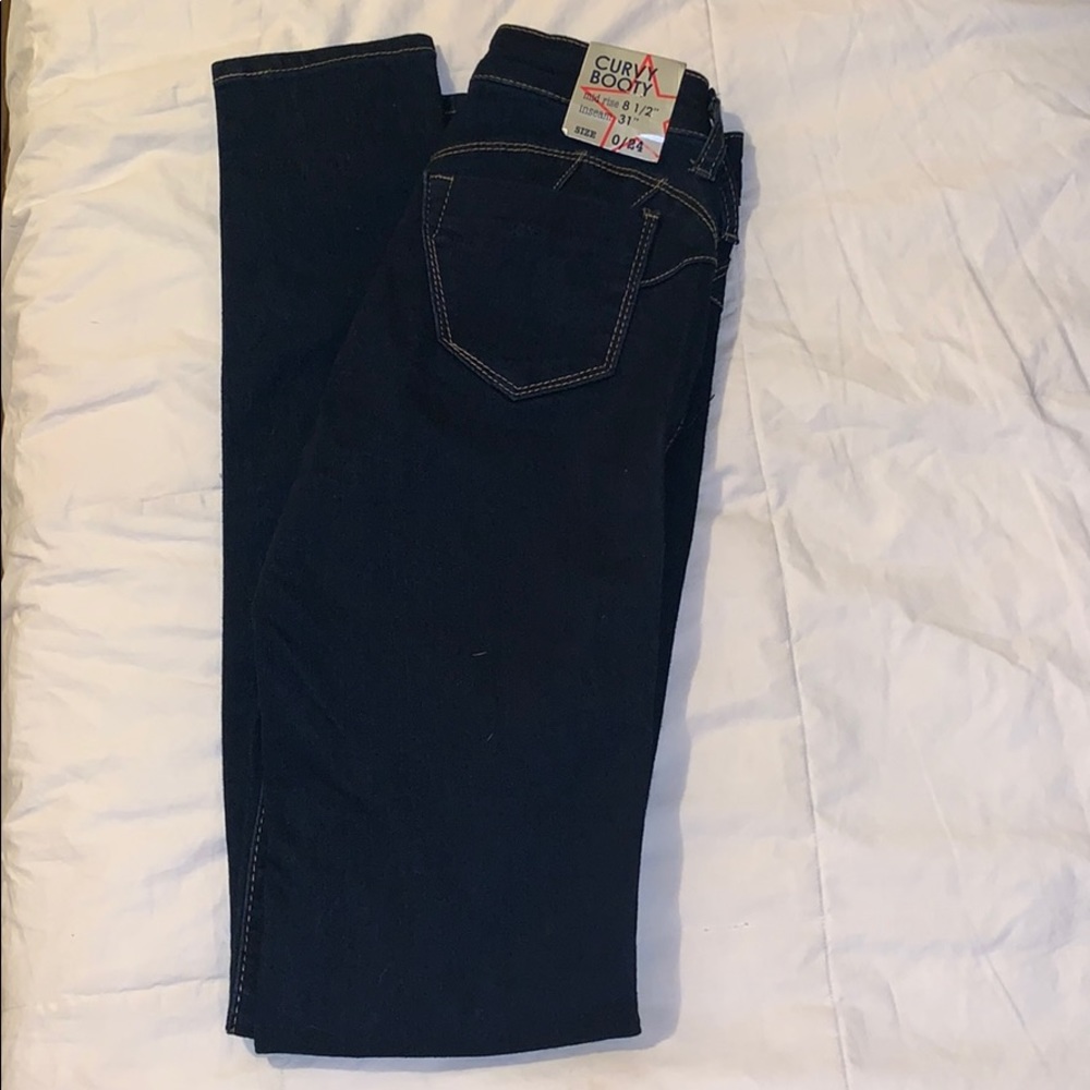 New dark denim jeans